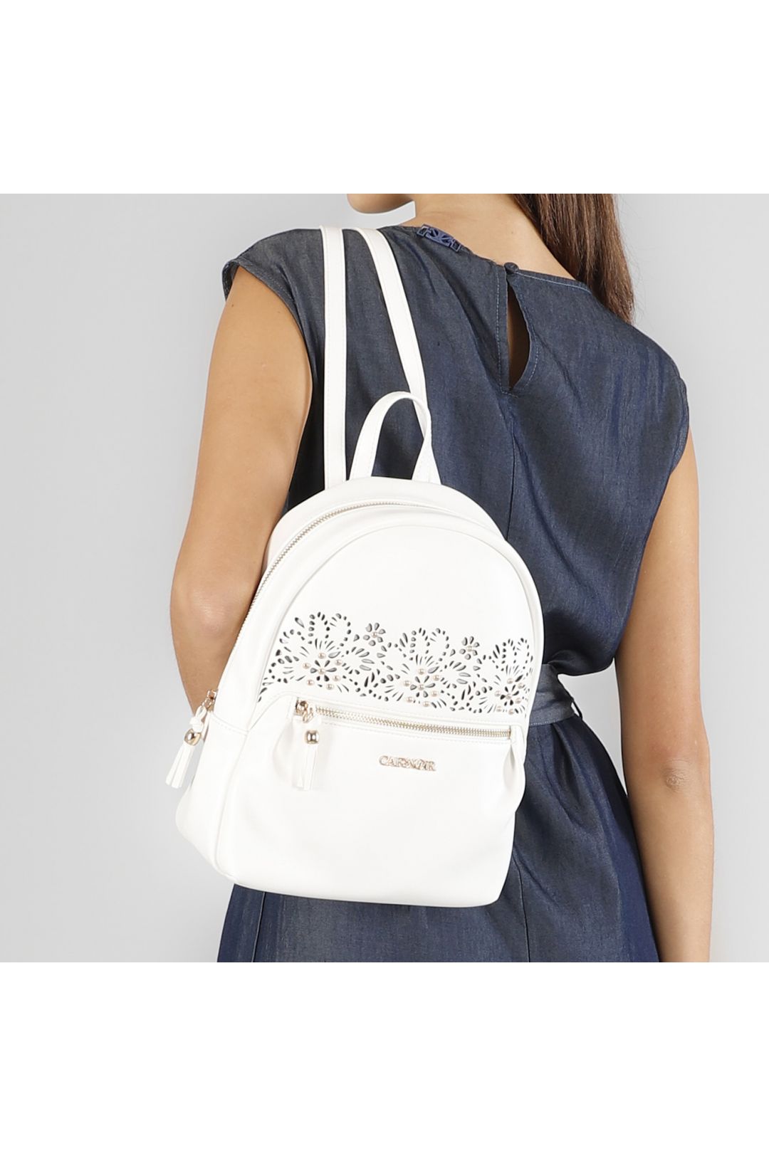 Zaino con laseratura floreale tasca zip e dettagli decorativi